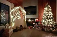 Play theatre decorated with string lights in living room setting