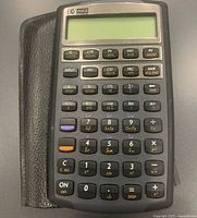 Front view showing keypad, display, HP 10bII branding, cover partially visible