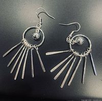 Front view of both sterling silver tassel earrings
