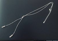 Full view of sterling silver adjustable Y-necklace with extender and bead drops
