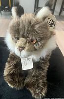 Front view of WWF lynx plush showing tag and facial details