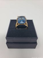 Ring on black foam in gift box showing stone and setting