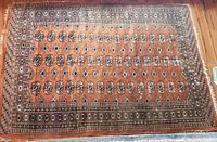 Full view of entire rug showing pattern and overall condition
