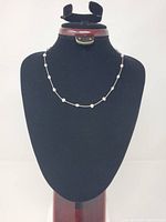 Full view of necklace displayed on jewelry bust