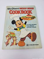 Front cover showing title graphics and characters