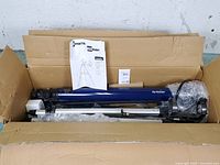 Telescope parts and manual inside open box
