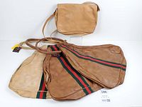 Group shot of four vintage leather bags