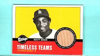 Front of Dusty Baker card with bat piece