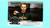 Front of Connor Bedard Milestone Pucks insert card showing player image and Blackhawks branding