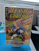 Front cover of Flash Gordon #5 comic showing issue number, publisher, price, protective bag