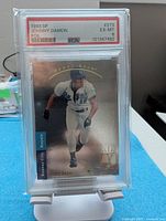 Front of PSA-graded Johnny Damon SP foil card