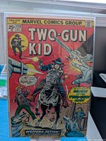 Front cover of Two-Gun Kid #120 in bag and board