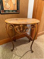 Full view of oval metal accent table