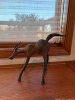 Full view of gazelle clay sculpture