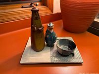 Full lot showing both bell figurines, bowl and tray