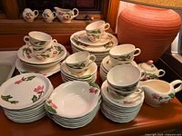 Group view of entire dinnerware set on countertop