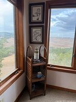 Full view of wicker rattan shelf in corner