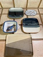 All five stoneware trays together