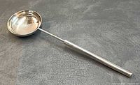 Full view of Sabattini serving spoon showing handle and bowl