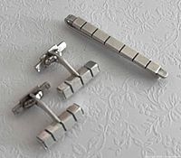 cufflinks and tie clip front view showing block design