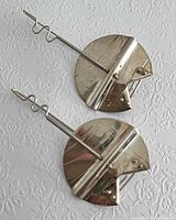 Front view of both earrings showing geometric design