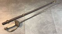 Full view of sword and scabbard