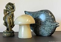 Group shot of all three carved stone items