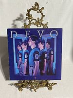 Front cover of Devo New Traditionalists album