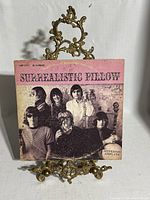 Front cover displaying album title and band photo