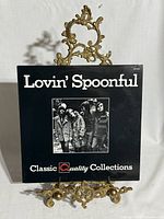 Front sleeve displaying title, band photo and series branding