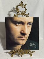 Front jacket showing portrait cover and album title