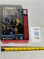 Front view of sealed Hightower box with measuring tape showing size