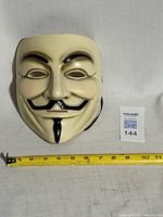 Front view showing painted details and size reference