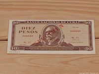 Obverse of 1969 Cuba 10 Pesos specimen banknote showing portrait, denomination, red SPECIMEN overprint, serial 000000