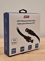 Front of iCAN CAT7 Ethernet Patch Cable box showing branding and specifications like 15 ft length, RJ45, S/FTP, UL, 10 Gbps