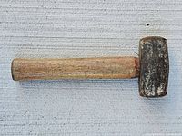 Profile view of hammer showing full length and head