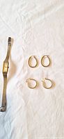 Watch and four earrings overview