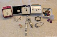 Full lot overview showing all 11 jewellery items and watches