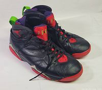 Front angled view of both sneakers showing overall design, colourway and condition