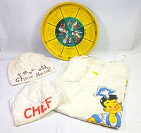 Overall lot showing tray, two hats and aprons