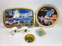 Full lot view showing both trays, ashtrays, salt and pepper shakers