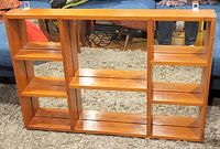 Front view showing mirror, compartments, overall condition