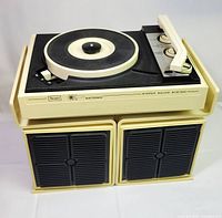 overall view of Sears turntable on stand with two speakers underneath