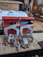 Toolbox, eight Kant-Twist clamps arranged on floor