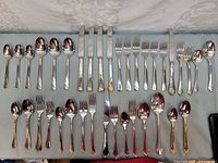 Full layout of all flatware pieces on table