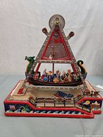 Front view of Lemax Viking Ship ride showing figures, lights and base
