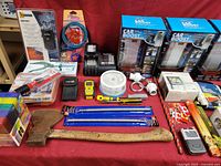 Overall view of all items laid out on red cloth