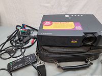 Projector with cables, remote and case