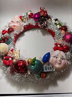 Full view of wreath showing overall design and variety of vintage ornaments