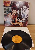 Front gatefold jacket with Bowie artwork and record